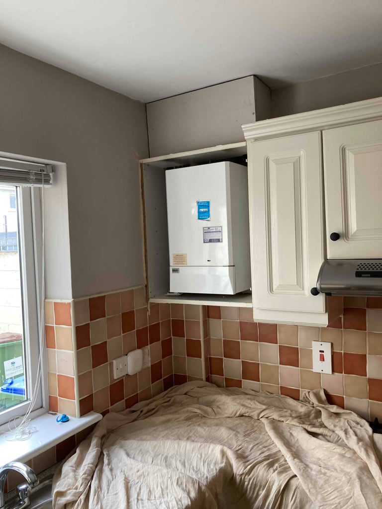 Boiler in cabinet